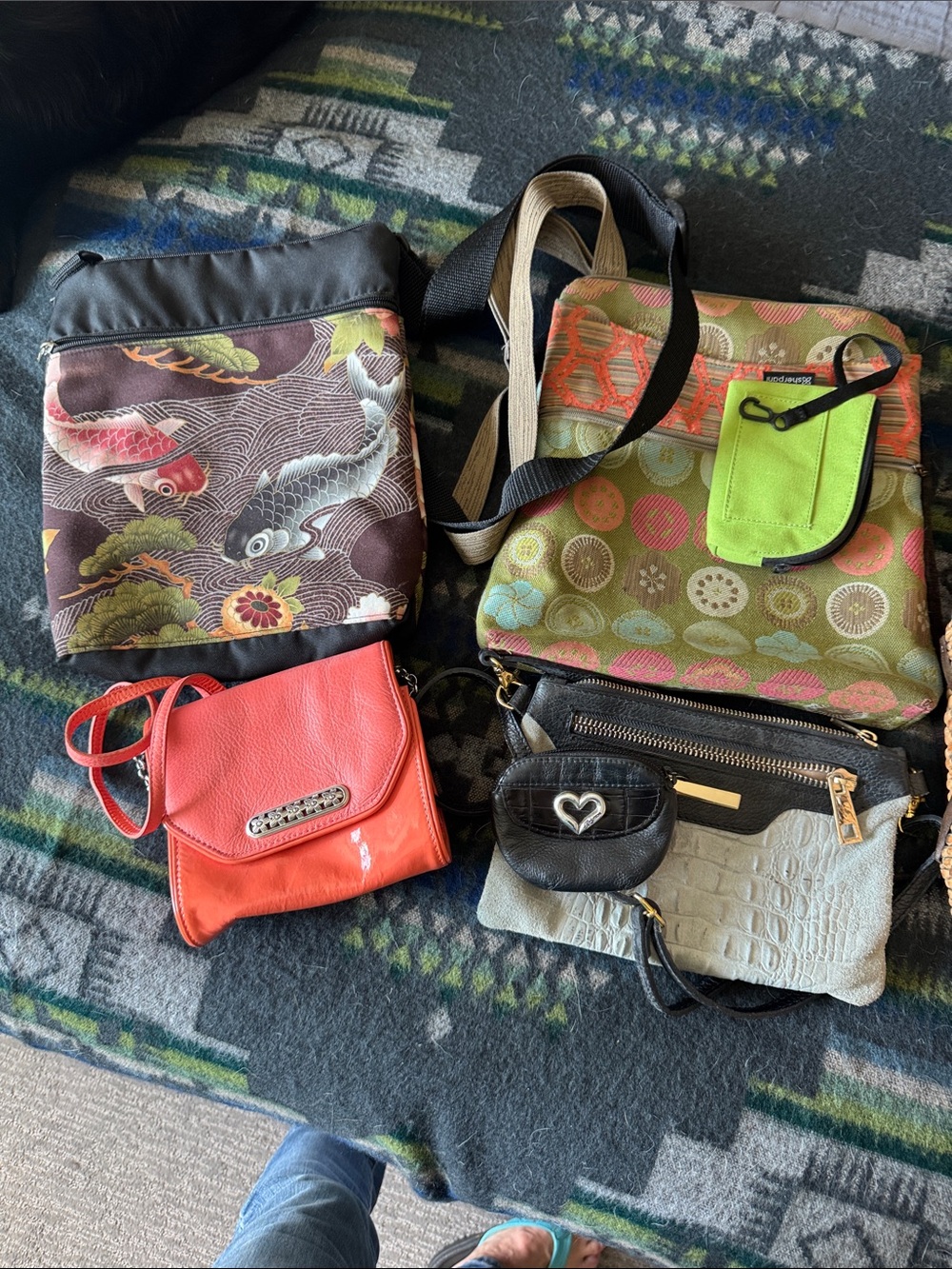 4 crossbody bags 2 fabric 1 leather orange one is Brighton take all